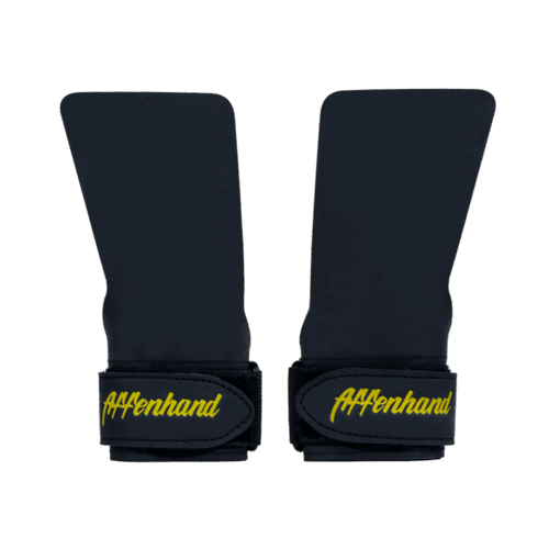 Zwei schwarze Affenhand No Chalk Grips mit gelbem Logo.